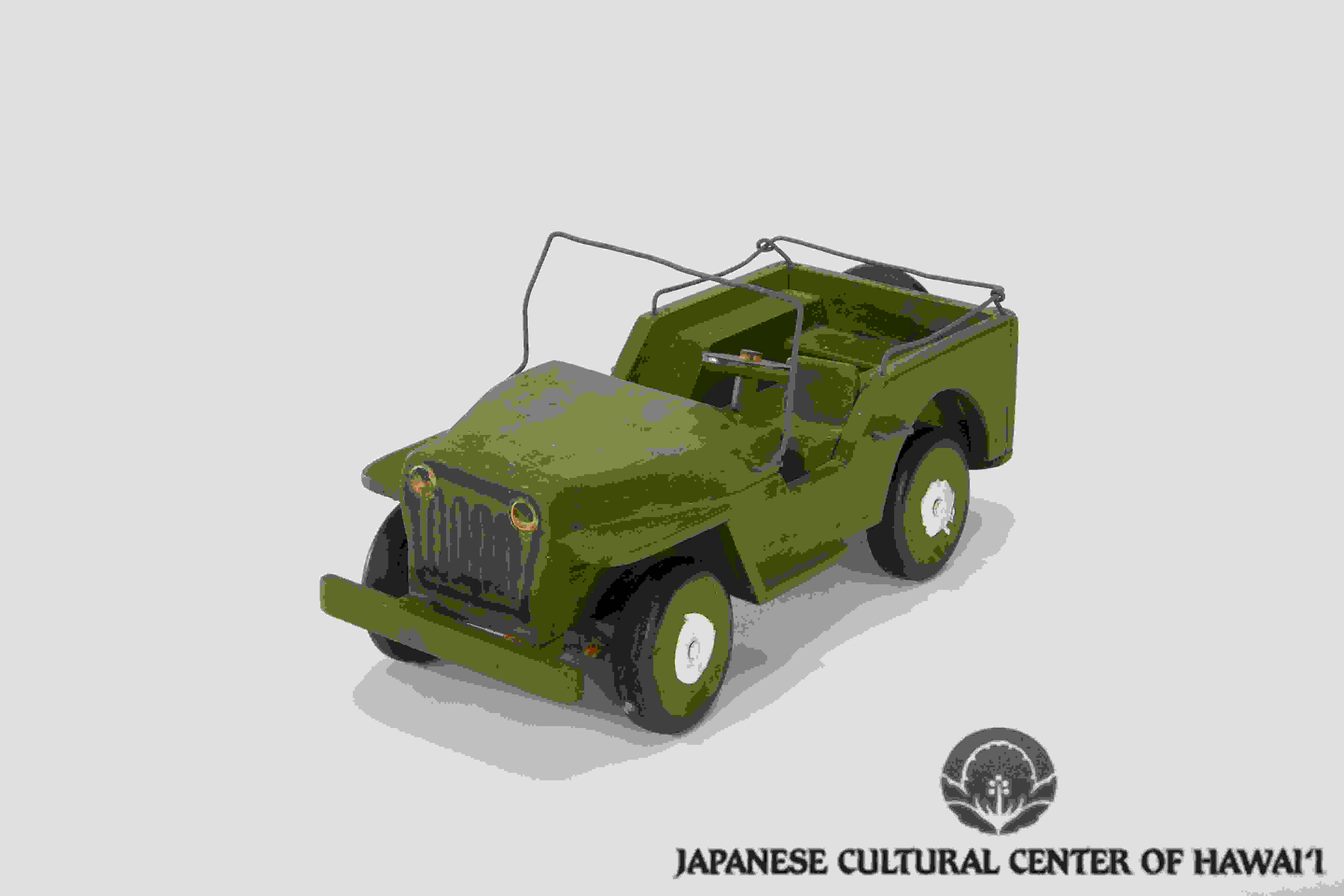 Wooden toy jeep crafted by Nishimura