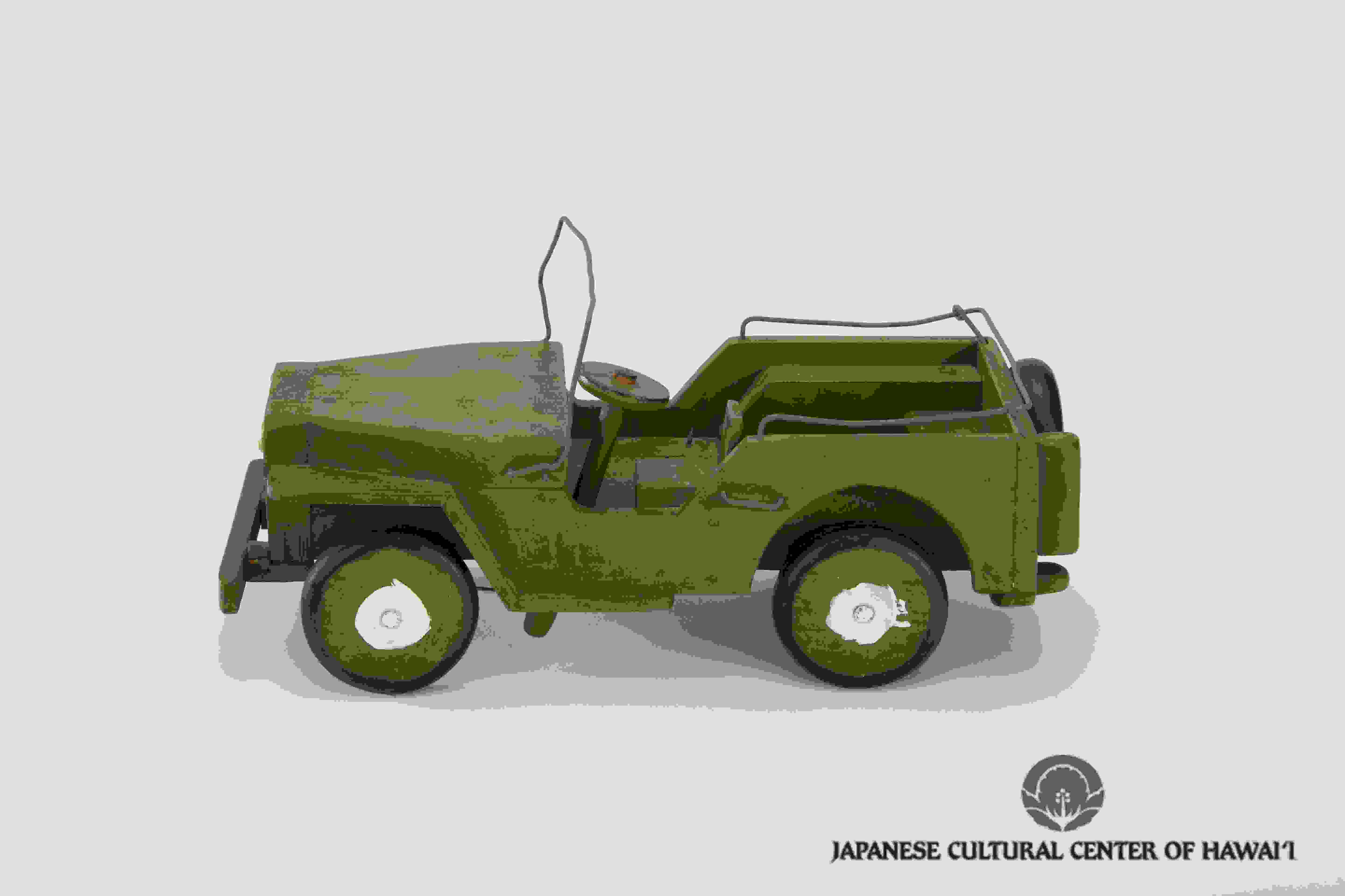 Wooden toy jeep crafted by Nishimura