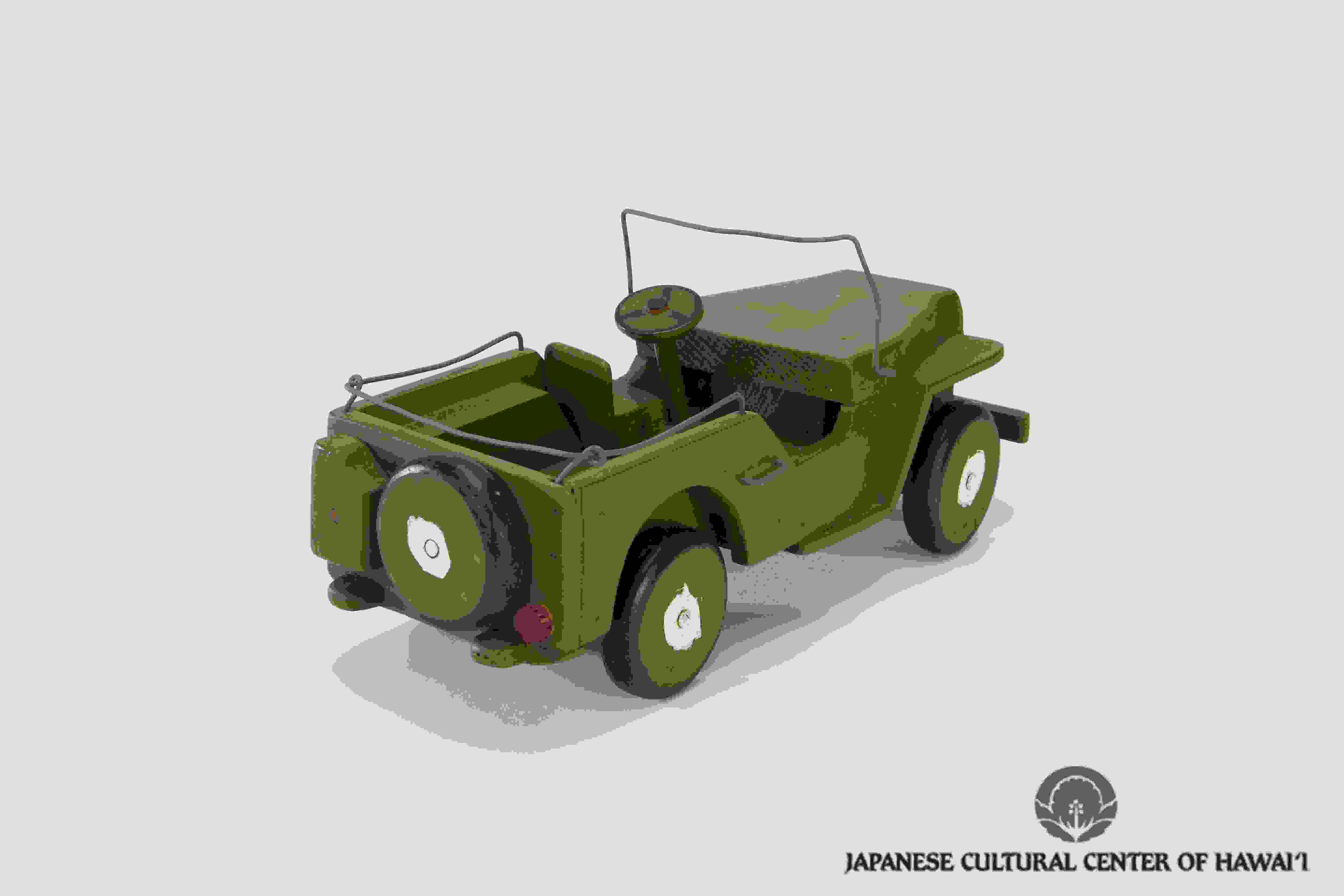 Wooden toy jeep crafted by Nishimura