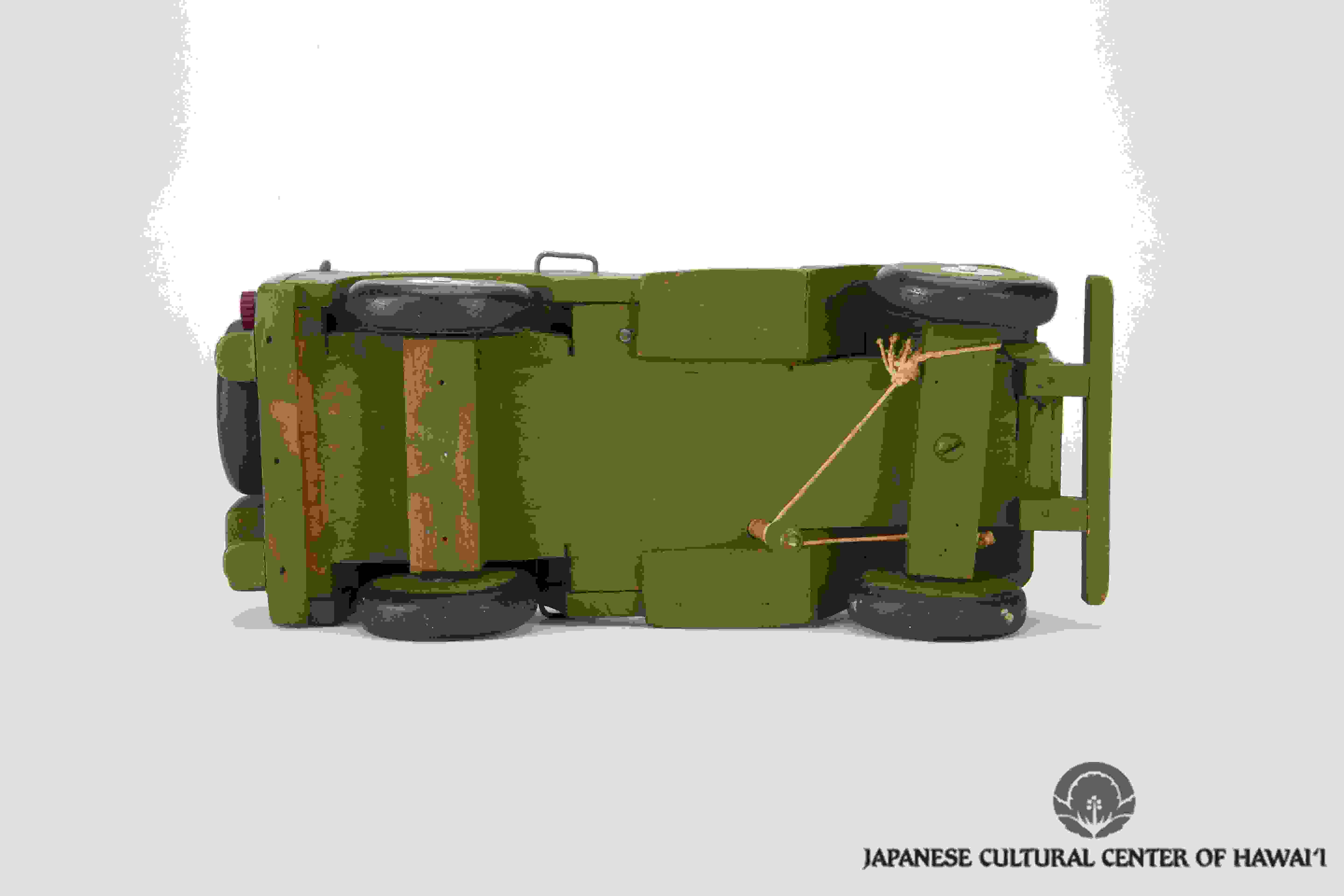 Wooden toy jeep crafted by Nishimura