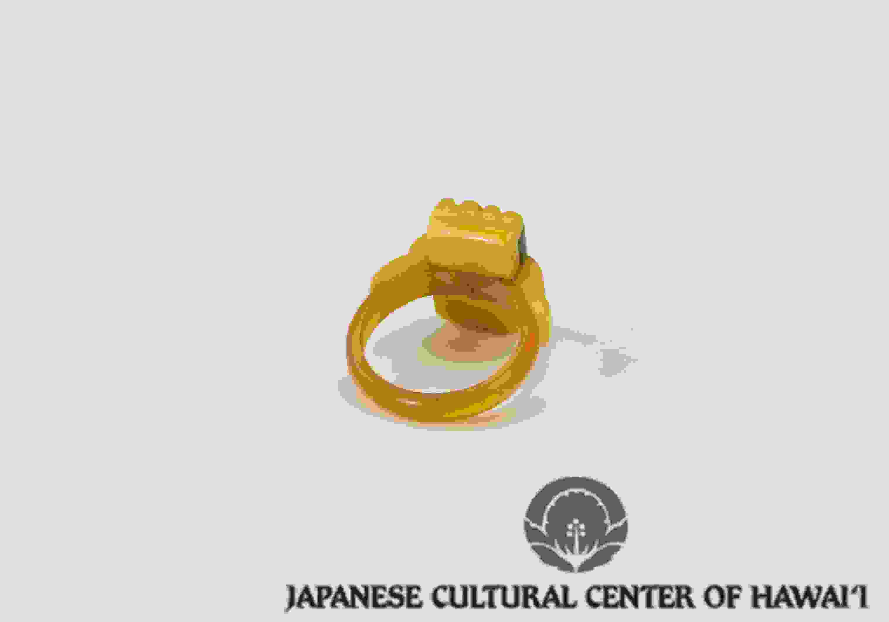 Green rectangular ring crafted by Nishimura