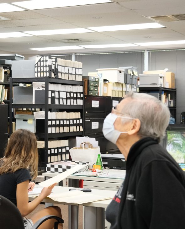 People having a discussion at the Tokioka Heritage Resource Center